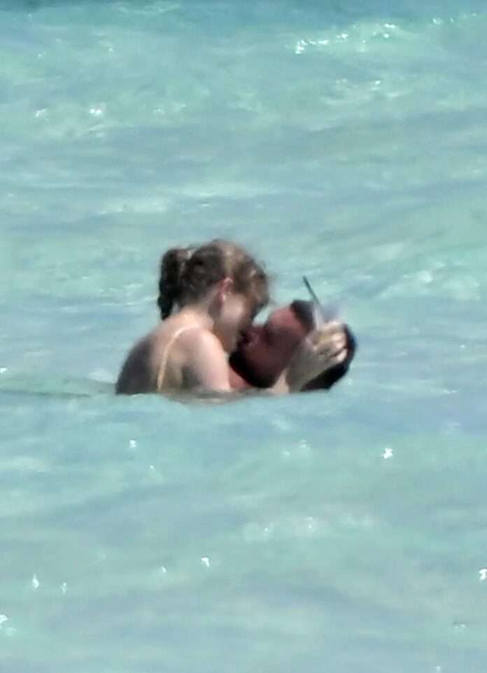 The behavior of Taylor Swift and Travis Kelce in the Bahamas has drawn criticism as they were spotted making out in the water while wearing only their swimwear. This is not the first time this has happened, and upset fans are demanding that they find a more private location.