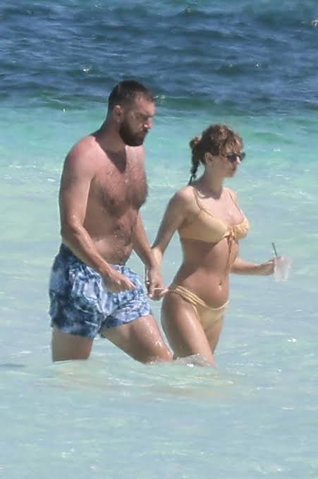 Critics and naysayers mercilessly attack Taylor Swift for sporting a minuscule swimsuit, and they shame Travis Kelce for his supposed "dad bod" while on their amorous trip to the Bahamas. However, loyal fans rise up in defense, telling detractors to "zip it" and let the couple enjoy their well-deserved holiday.