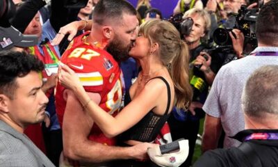 Watch: Taylor Swift and Travis Kelce share a sweet display of affection in front of their fathers following the Chiefs' victory.  