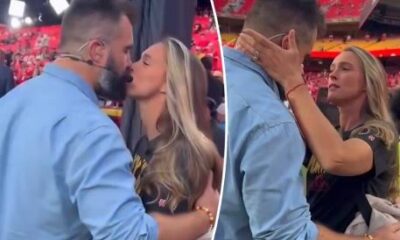 Watch: Jason Kelce exhibits uncommon public displays of affection with his wife Kylie on the sidelines during the Chiefs game.