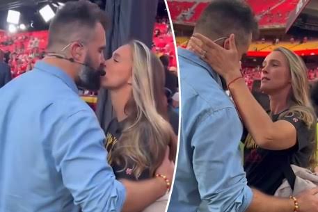 Watch: Jason Kelce exhibits uncommon public displays of affection with his wife Kylie on the sidelines during the Chiefs game.